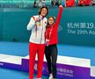 Julia Moldovan și Zhizhen Zhang, cu medalia de aur de la Jocurile Asiatice
