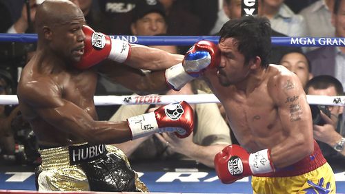 Floyd Mayweather Jr. și Manny Pacquiao, aici în timpul luptei din 2015 Foto: Imago Images